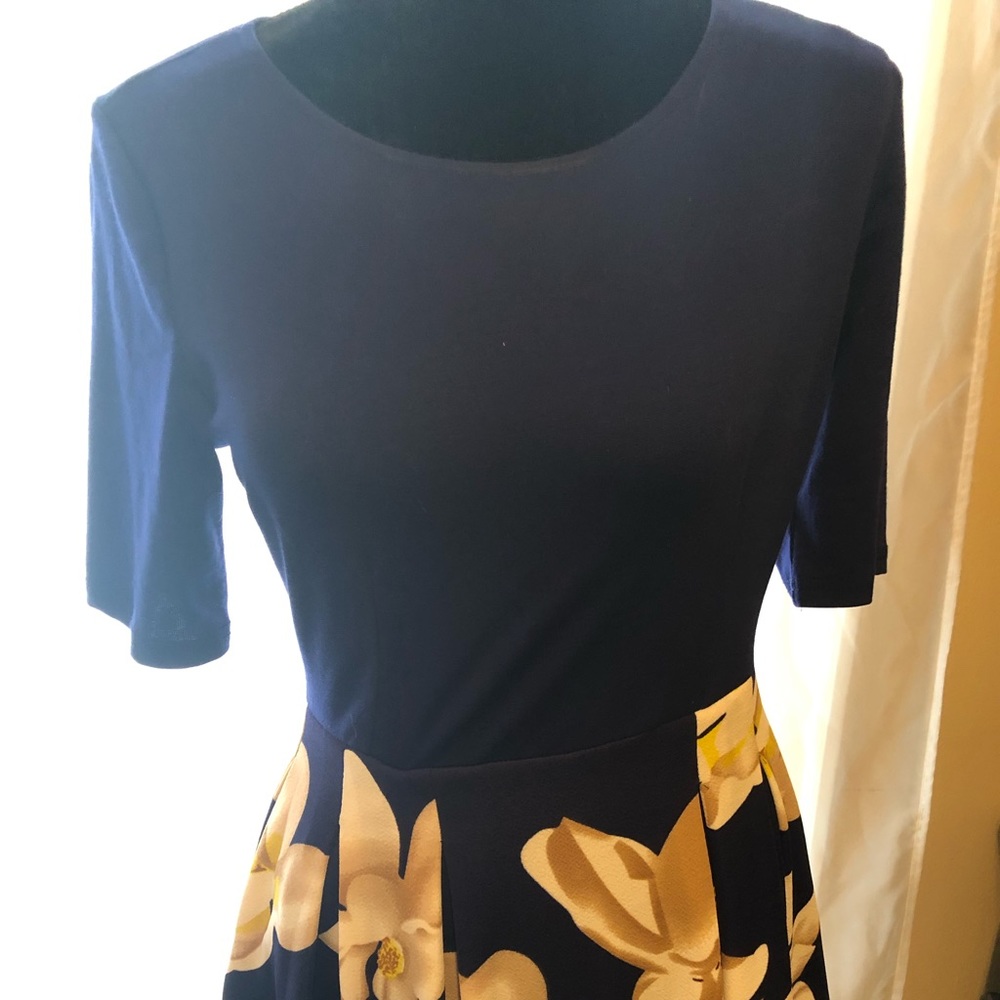 Cute dress with pocket and new with tags
